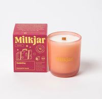 Milkjar candle and packaging on a white background