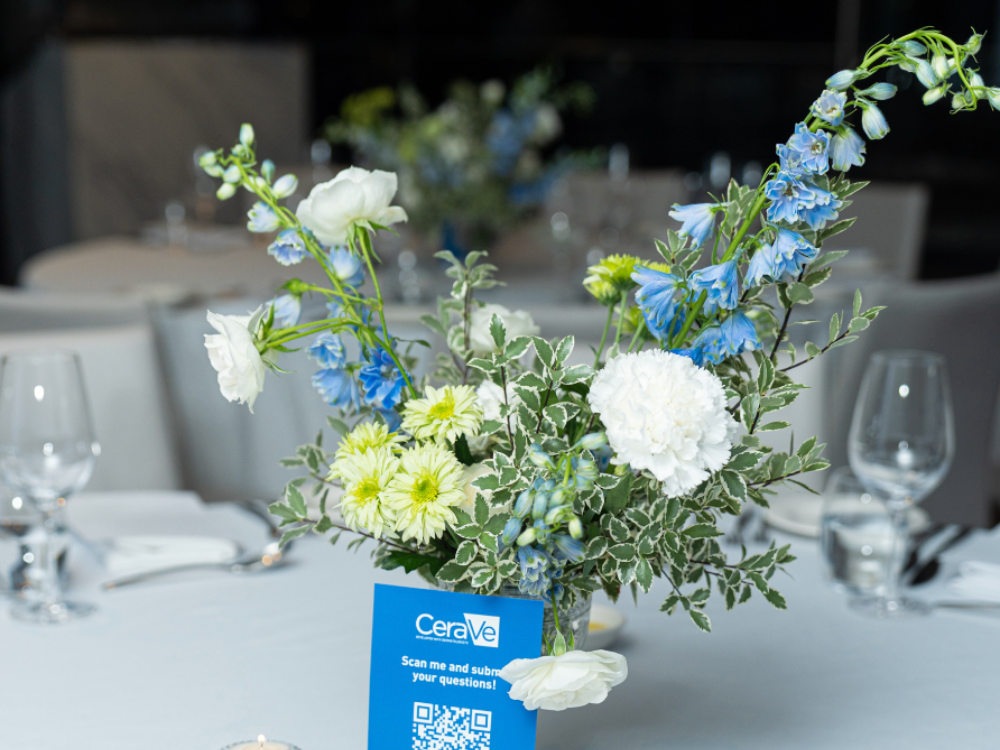 Floral arrangement on a table with CeraVe branding