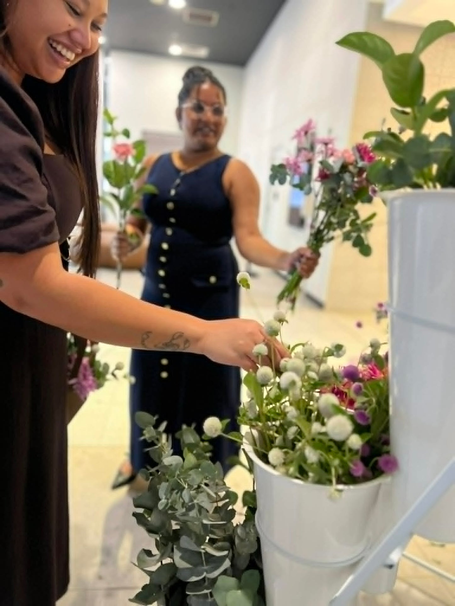 ladies making flower bouquets