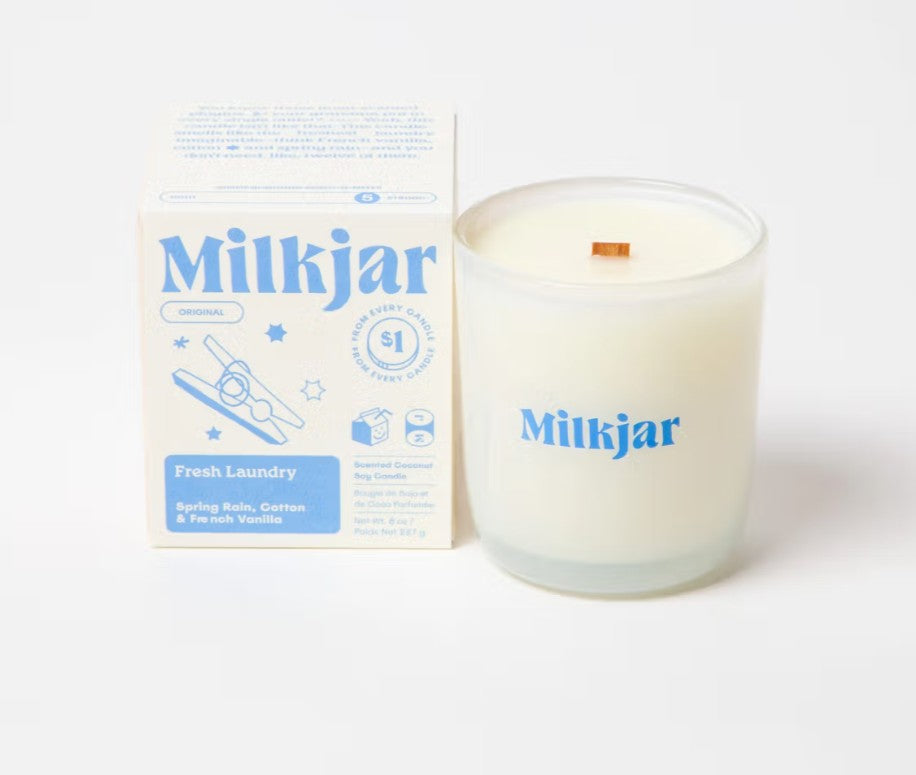 Milkjar candle and packaging on a white background